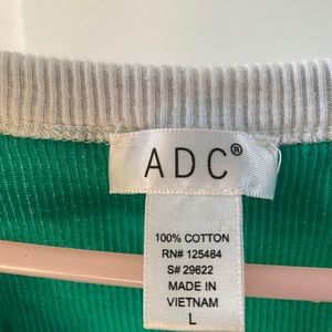 white collared green tank